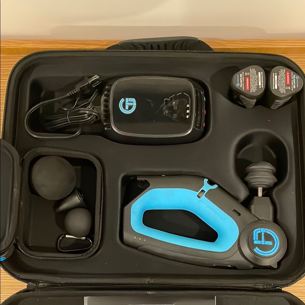 Blue and Black Massage Device